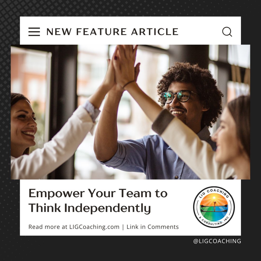 Smiling business team giving a group high five, symbolizing collaboration, trust, and empowerment in a workplace setting